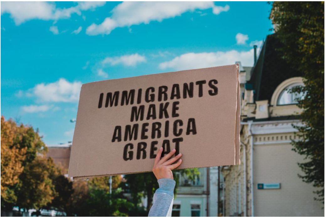 Protest sign reading Immigrants make america great